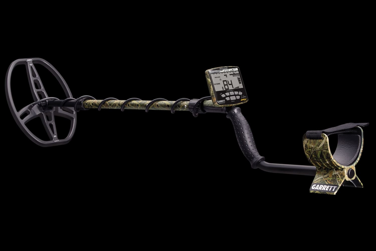 A Garrett Ace Apex - Jase Robertson edition metal detector with a black and green camouflage armrest and stem and featuring a digital display screen, shown against a solid black background.